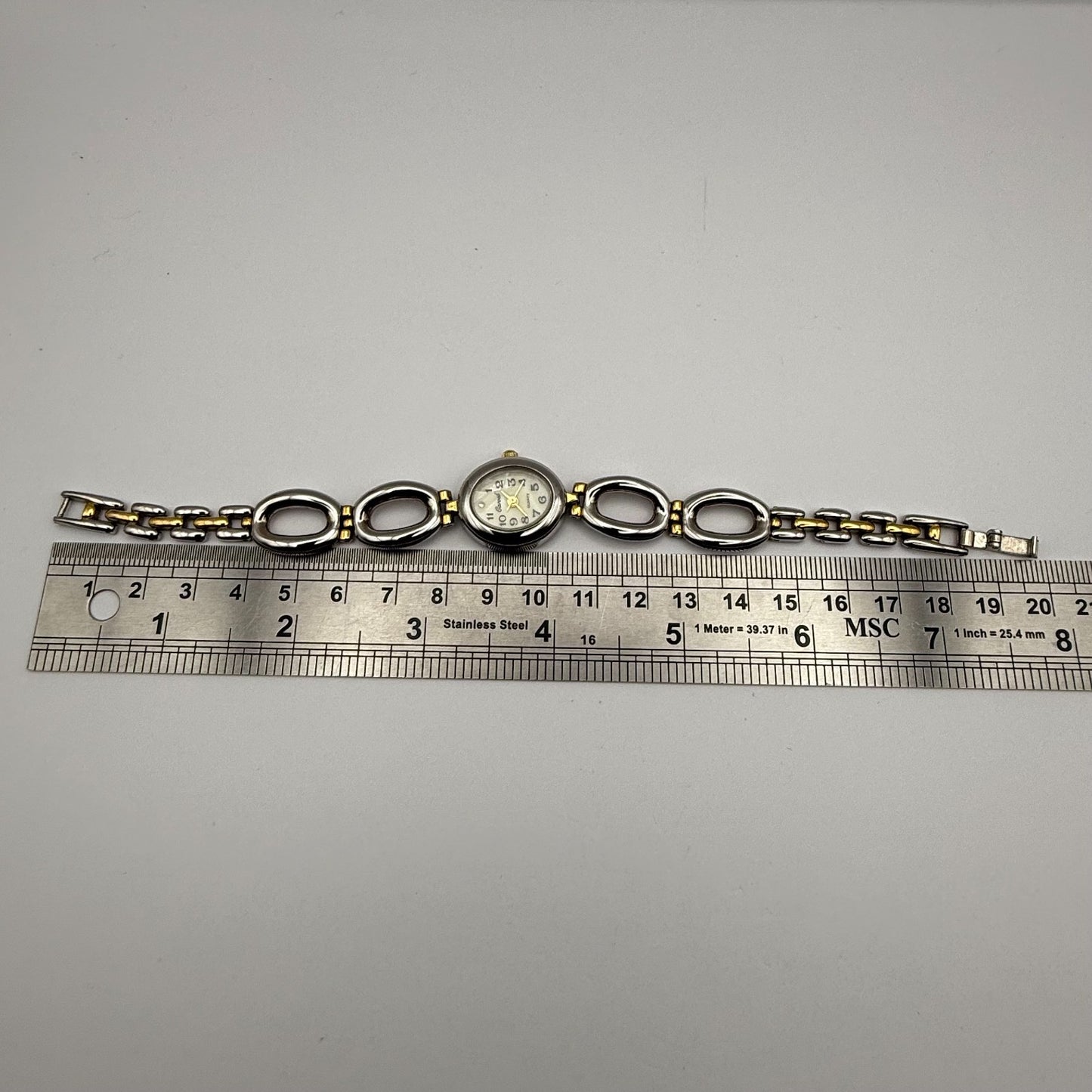 Carvel Ladies Quartz Watch MOP Oval Dial Silver Gold Tone Bracelet Working 19mm