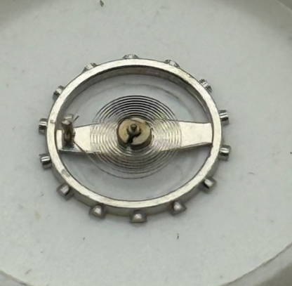 BRAC 2061 Balance Wheel Complete And Spring 7 3/4''' Watch Movement Parts NOS
