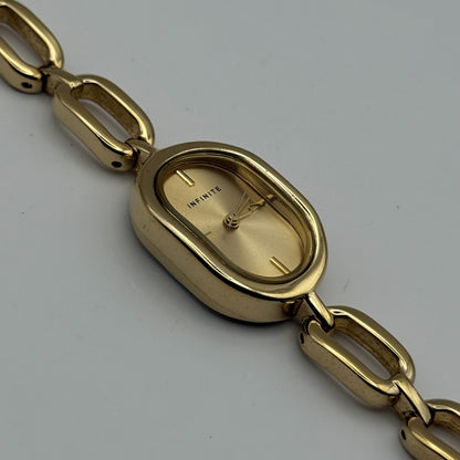 Infinite Ladies Quartz Watch Oval Dial Gold Tone Bracelet Japan Working 19mm