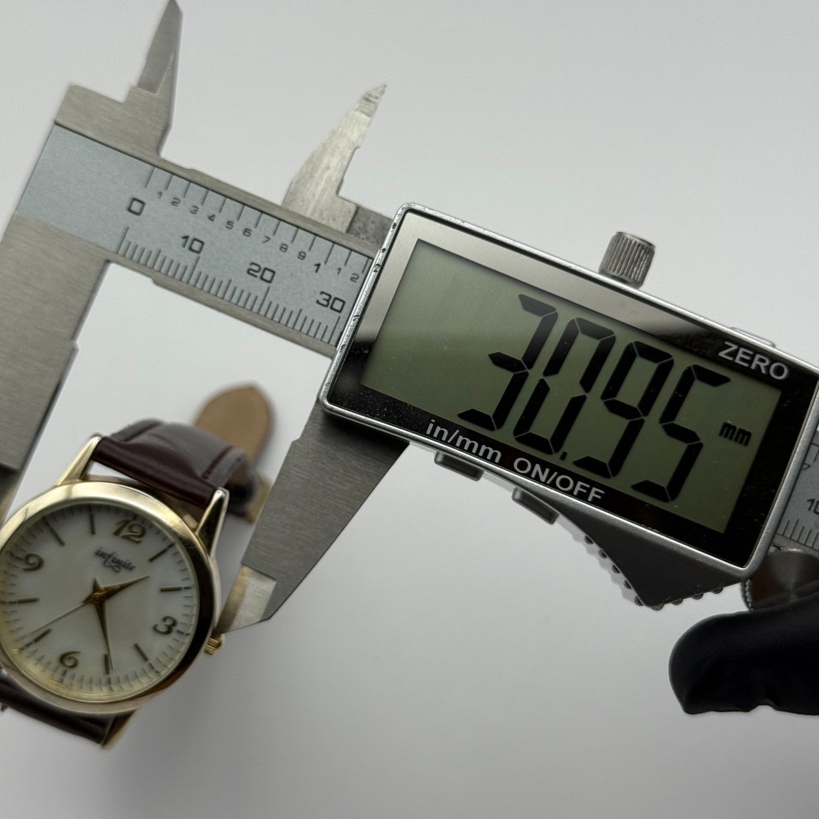 Infinite Ladies Quartz Watch Mother of Pearl Dial Brown Strap Japan Working 31mm