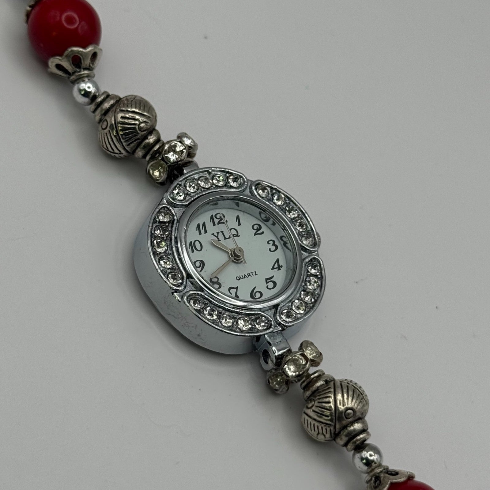 YLQ Ladies Quartz Watch Crystal Accent Case Red Beaded Bracelet Working 25mm