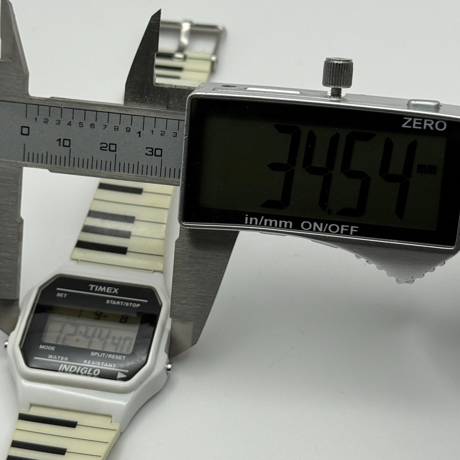 Timex Indiglo Digital Quartz Watch Piano Strap White Black Strap Working 34mm