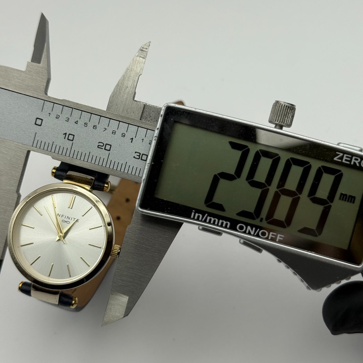 Infinite Ladies Quartz Watch Silver Dial Blue Leather Strap Japan Working 28mm