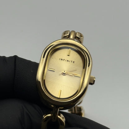 Infinite Ladies Quartz Watch Oval Dial Gold Tone Bracelet Japan Working 19mm