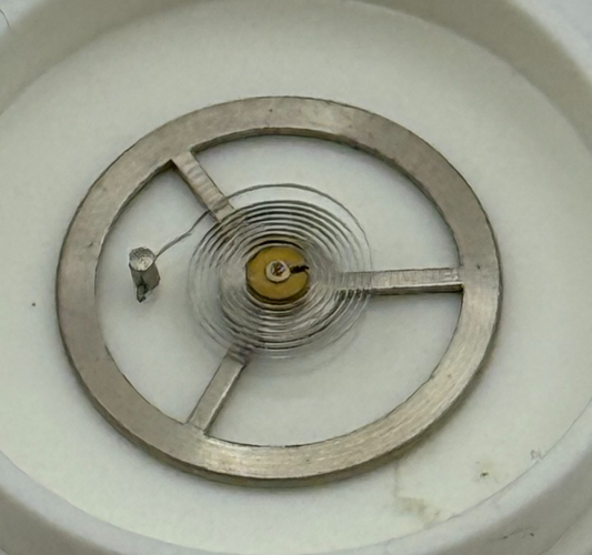 EB 1197 Balance Wheel Complete And Spring  10½’’’ 102 M Watch Movement Parts NOS