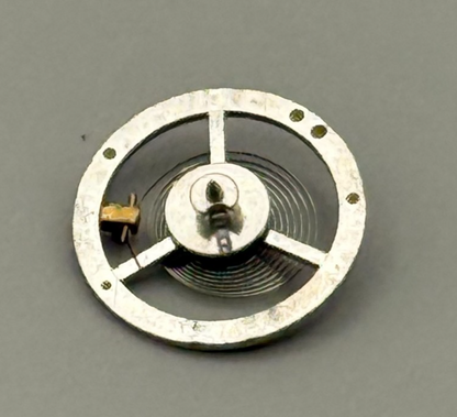 BRAC 180 Balance Wheel Complete And Spring 12’’’ PL Watch Movement Parts NOS
