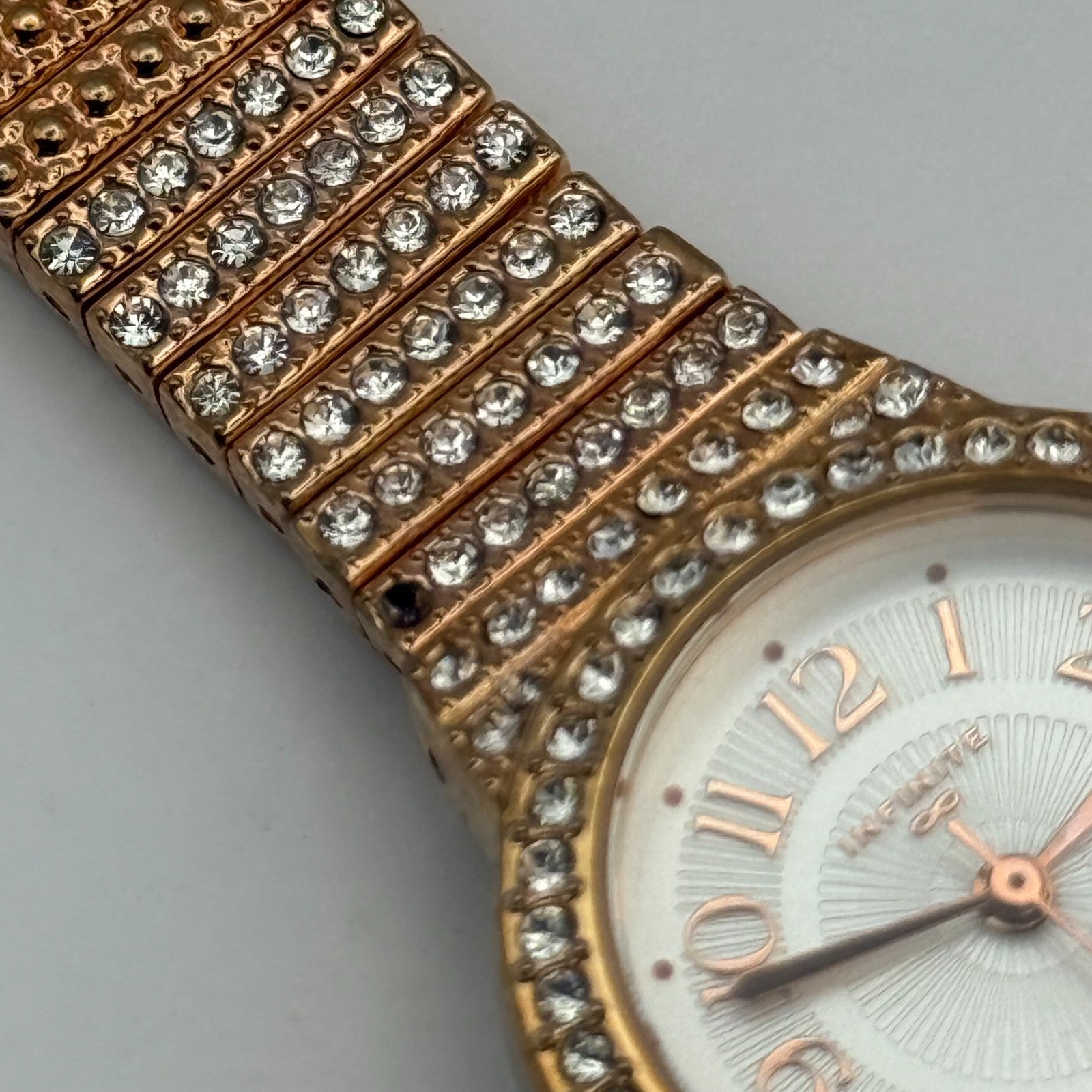 Infinite Ladies Quartz Watch Gold Tone Crystal Accents Bracelet Working 25mm