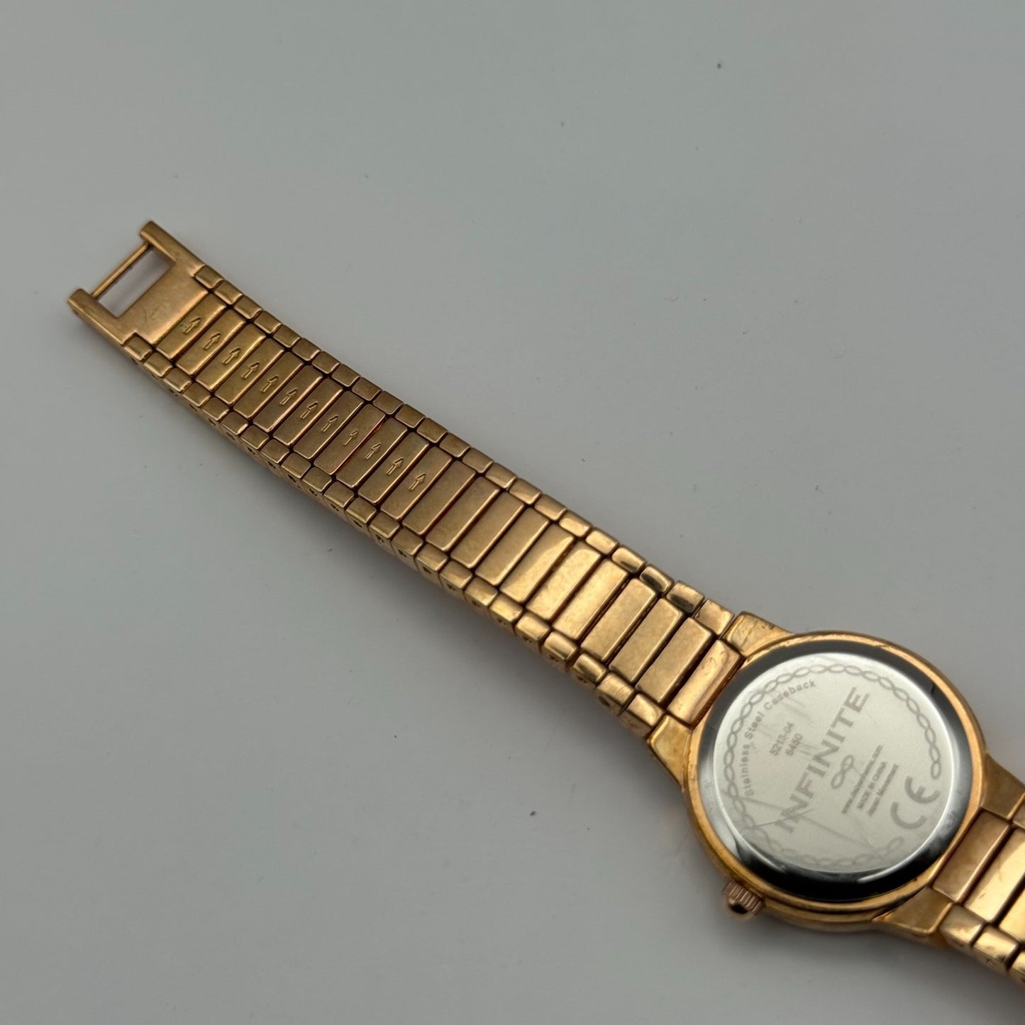 Infinite Ladies Quartz Watch Gold Tone Crystal Accents Bracelet Working 25mm