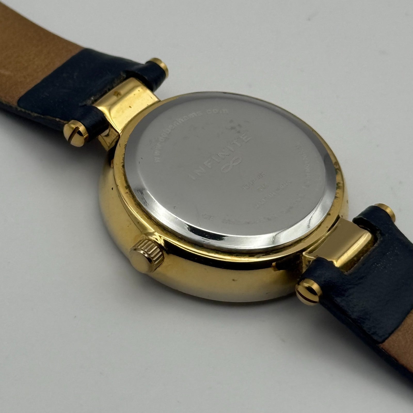 Infinite Ladies Quartz Watch Silver Dial Blue Leather Strap Japan Working 28mm