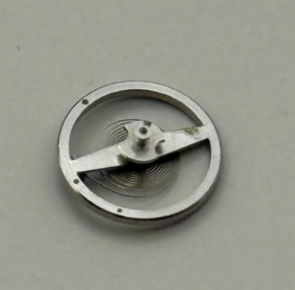 Cris 440 Balance Wheel Complete And Spring  6¾’’’ 974 M Watch Movement Parts NOS