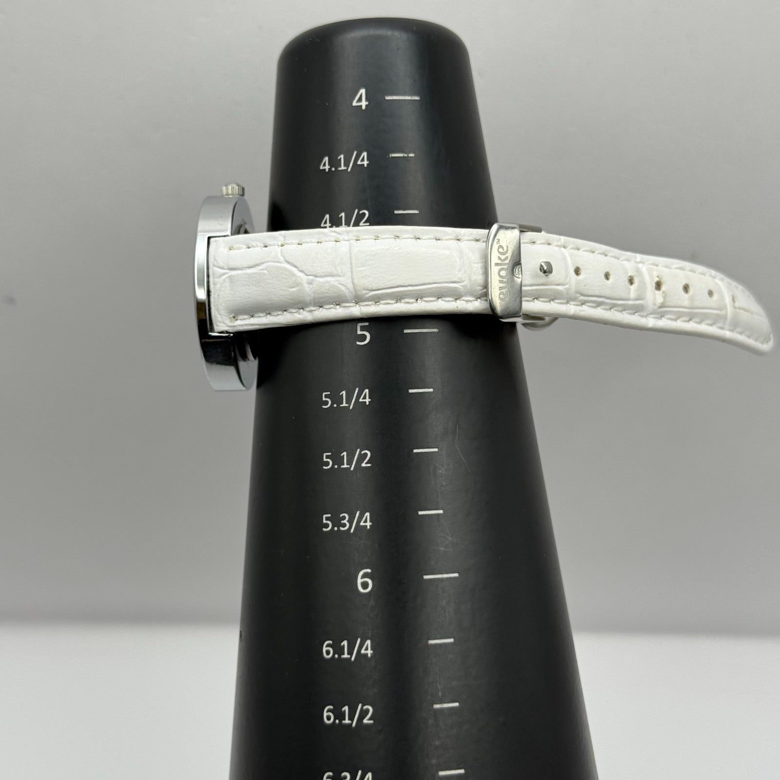 Evoke Ladies Quartz Watch Silver Dial Glitter Bezel White Strap Working 30mm