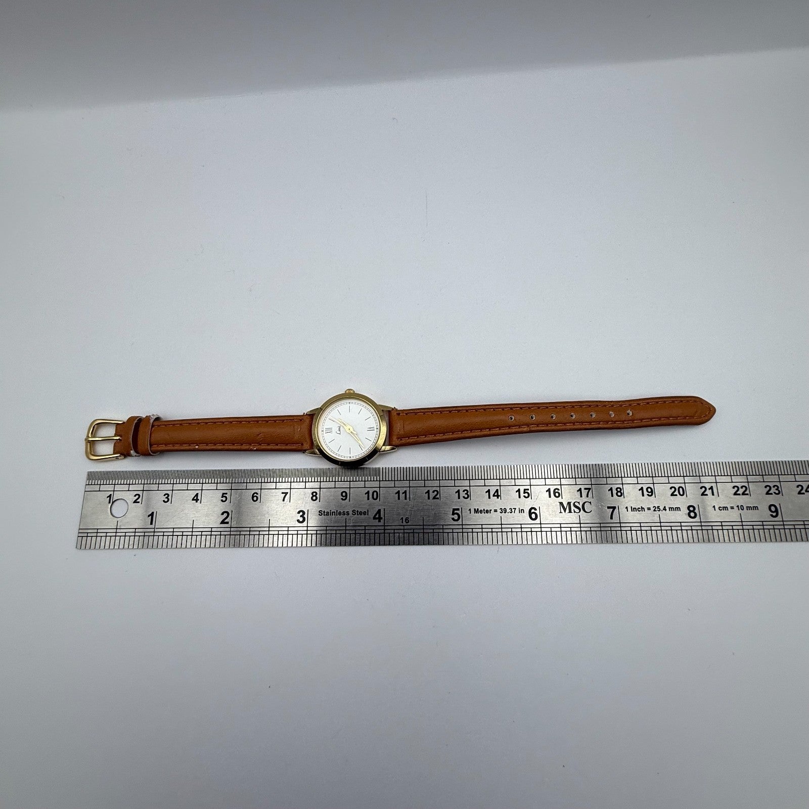 Limit Ladies Quartz Watch White Dial Gold Tone Case Brown Strap Working 25mm