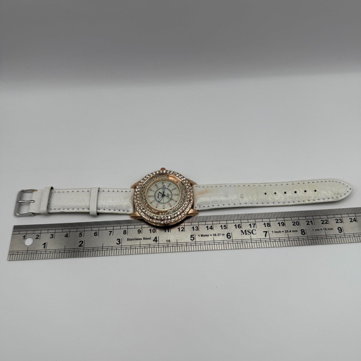 Gerryda Ladies Quartz Watch Rose Gold Crystal Accents White Strap Working 43mm