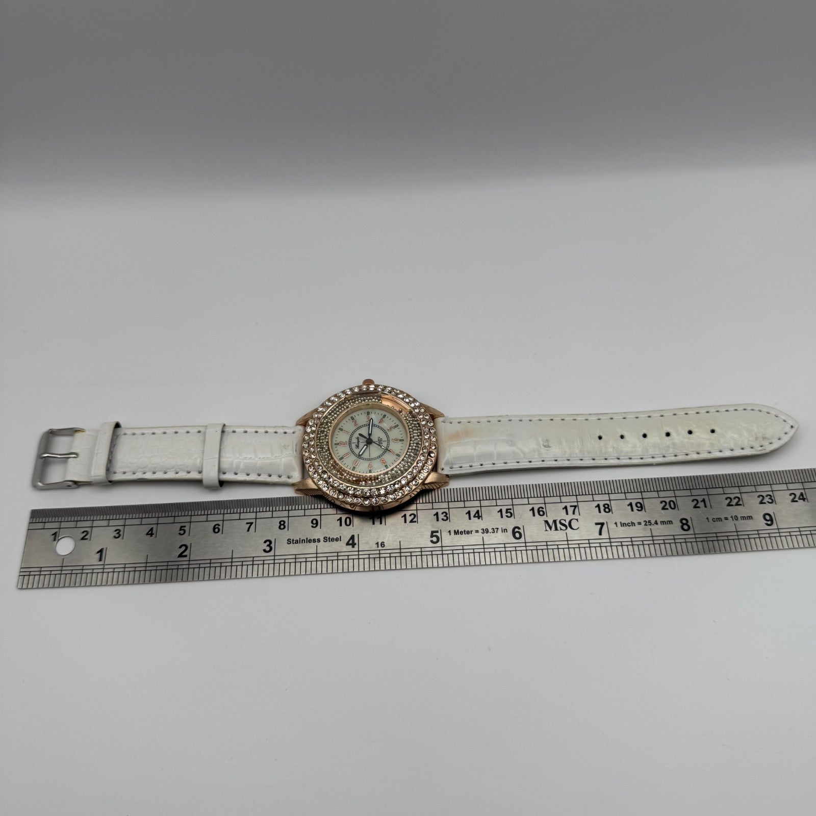 Gerryda Ladies Quartz Watch Rose Gold Crystal Accents White Strap Working 43mm