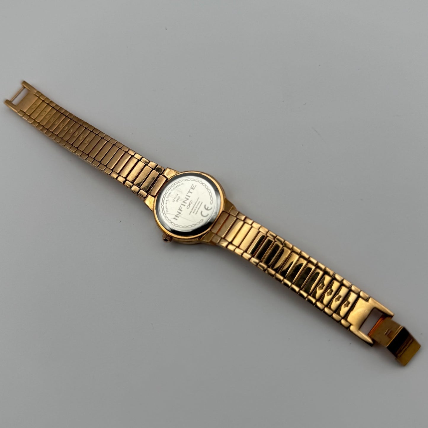 Infinite Ladies Quartz Watch Gold Tone Crystal Accents Bracelet Working 25mm