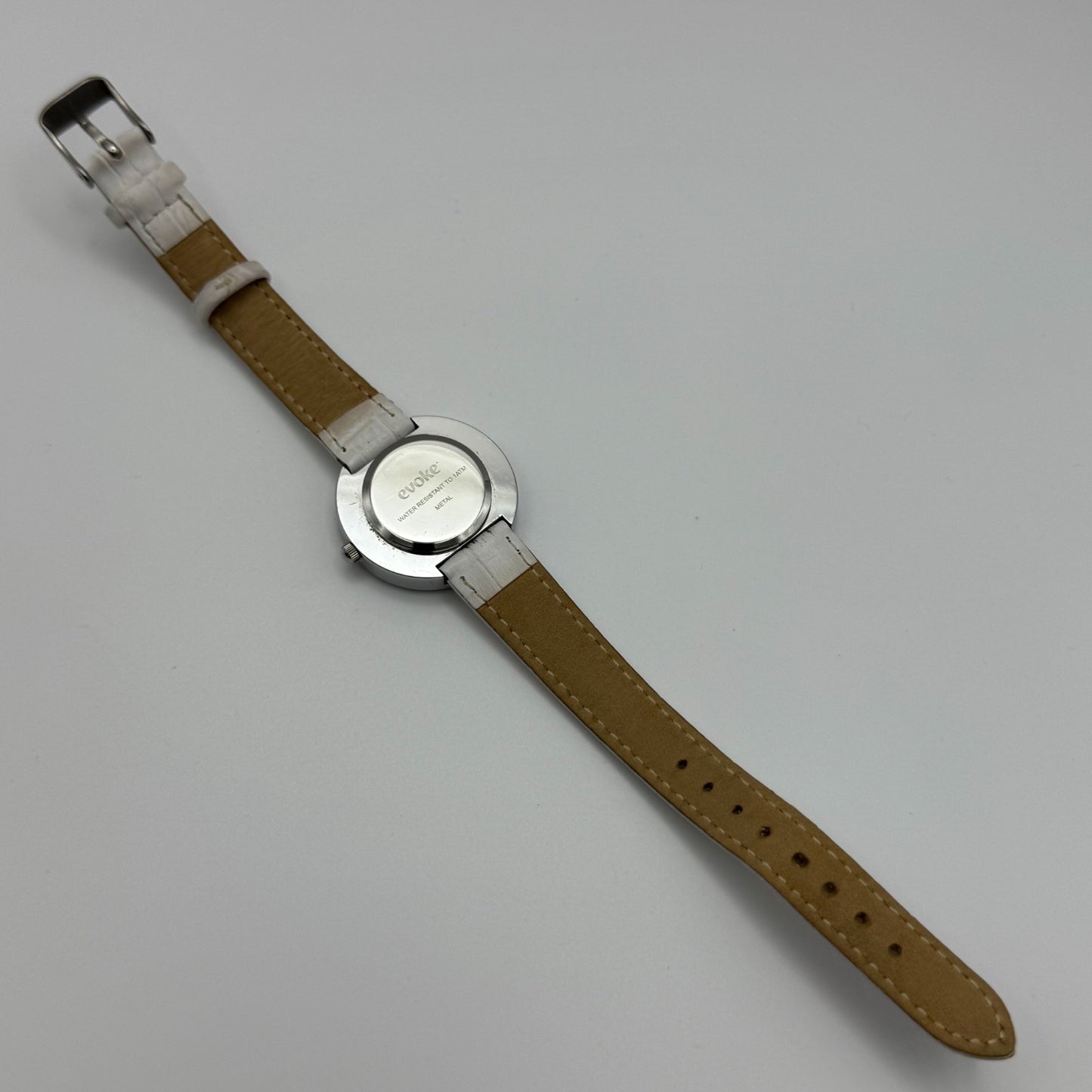 Evoke Ladies Quartz Watch Silver Dial Glitter Bezel White Strap Working 30mm