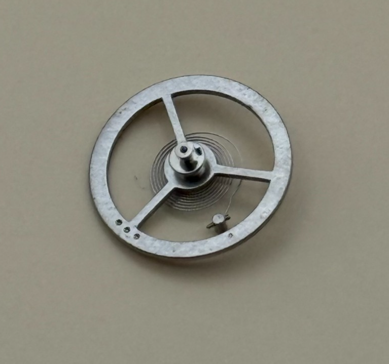 EB 1197 Balance Wheel Complete And Spring  10½’’’ 102 M Watch Movement Parts NOS