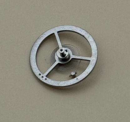 EB 1197 Balance Wheel Complete And Spring  10½’’’ 102 M Watch Movement Parts NOS