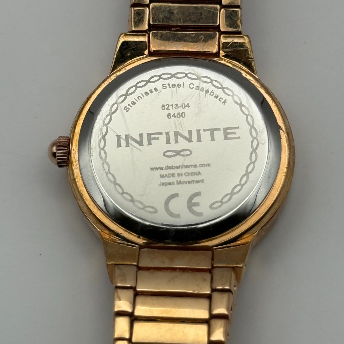 Infinite Ladies Quartz Watch Gold Tone Crystal Accents Bracelet Working 25mm