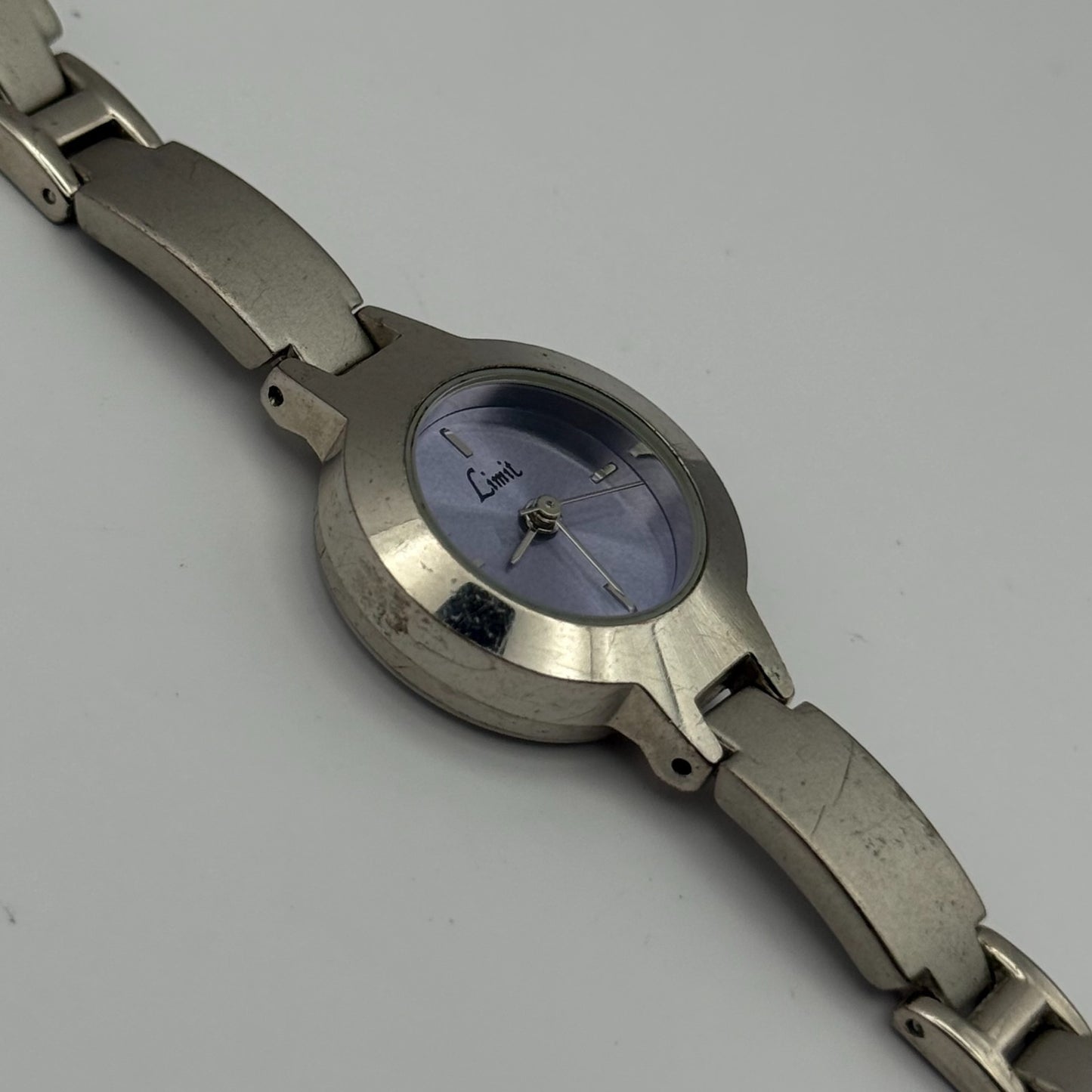 Limit Ladies Quartz Watch Purple Dial Silver Tone Bracelet Steel Working 21mm