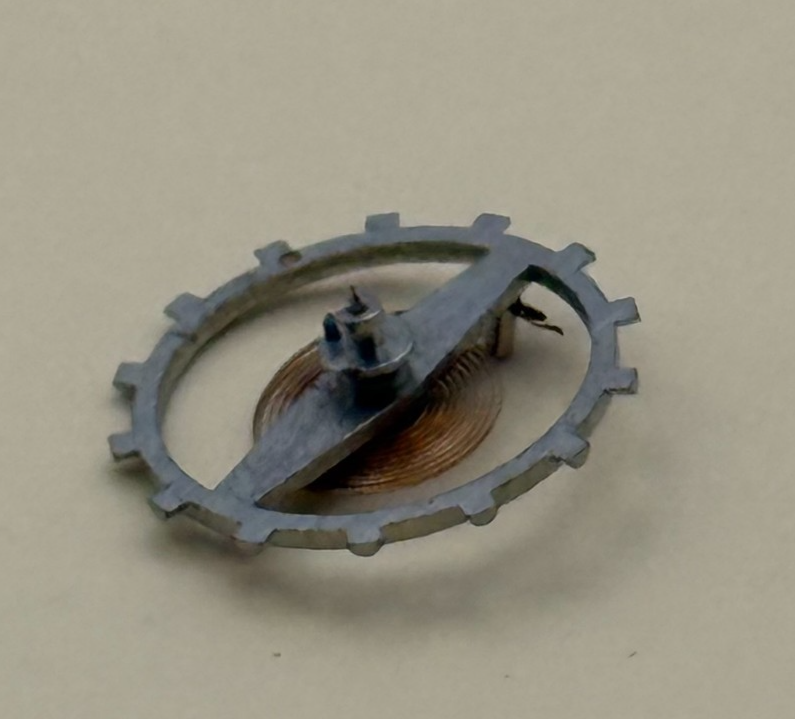 EB 1197 Balance Wheel Complete And Spring  10½’’’ 108 M Watch Movement Parts NOS